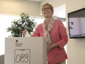Ontario Liberal leader Kathleen Wynne casts her ballot in the 2014 election.