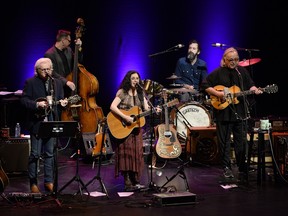 Ricky Skaggs, left, Sharon White, and Ry Cooder perform at Centrepointe theatre on Wednesday.