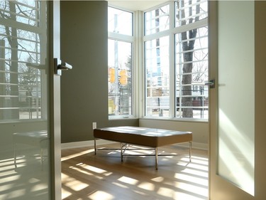 Flooded with natural light, a generous-sized front room is perfect for a home office.