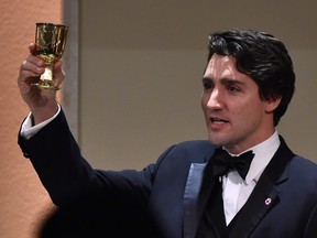Prime Minister Justin Trudeau, celebrates a toast in honour of Queen Elizabeth during the gala dinner of the Commonwealth Heads of State Meeting (CHOGM) in November 2015. Let's hope he doesn't pepper all his speeches abroad with talk of "Canadian values."