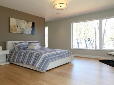 A generous master suite is one of four bedrooms in the two-storey home.