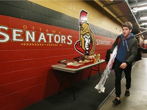 Mike Hoffman of the Ottawa Senators leaves the rink after locker clean out day at Canadian Tire Centre in Ottawa, April 11, 2016.   Photo by Jean Levac