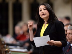 Minister of Democratic Institutions Maryam Monsef answers a question during question period in the House of Commons, on Parliament Hill, in Ottawa, on Friday, Dec. 11, 2015. Monsef is vowing to reduce the impact of money on federal politics amid new evidence that advocacy groups are becoming much more active in trying to influence the outcome of elections.