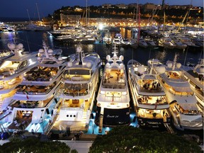 A general view shows yachts at Port Hercules during the 24th edition of the International Monaco Yacht Show in Monaco on September 25, 2014. The Monaco Yacht Show, which runs until September 27, is considered the most prestigious pleasure boat show in the world with the exhibition of 500 major companies in the luxury yachting and a hundred super and megayachts afloat.