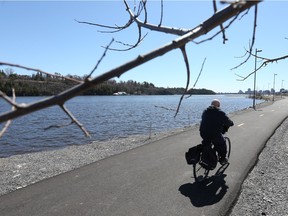Bikers enjoy the view along a new bike path on Rue Jacques-Cartier in Gatineau.