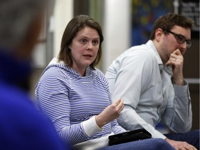 Ottawa Carleton District School Board Trustee, Erica Braunovan, left, and trustee Shawn Menard, right, faced some angry parents of kindergarten students at a public meeting about how to solve overcrowding at Elgin Street Public School.