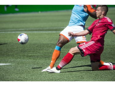 Ottawa Fury FC's Carl Haworth battles for the ball during the home-opener Saturday April 30, 2016 at TD Place against the Miami FC.   Ashley Fraser