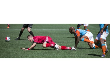 Ottawa Fury FC's Carl Haworth goes down during the Fury's home-opener Saturday April 30, 2016 at TD Place.   Ashley Fraser