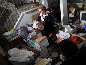 Elaine Birchall  is an Ottawa psychologist who treats hoarding disorder. She is seen in a client's home in this 2010 file photo.