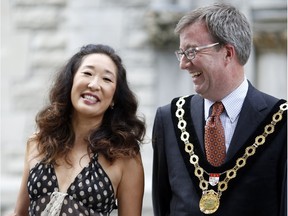 Ottawa-born actress Sandra Oh was presented with the Key to the City in 2013 by Mayor Jim Watson in recognition of her significant contributions and accomplishments nationally and internationally in the field of the performing arts.