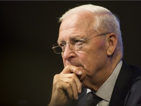 Ottawa Senators' Bryan Murray looks on at a press conference where he announced he's stepping down as general manager of the team but staying on as senior hockey advisor at the Canadian Tire Centre Sunday, April 11, 2016.