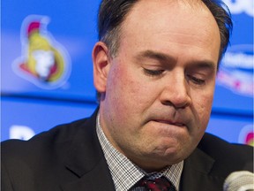 Ottawa Senators' new general manager, Pierre Dorion, is emotional as he speaks at a press conference to announce his succession of the position held previously by Bryan Murray at the Canadian Tire Centre, Sunday, April 10, 2016.