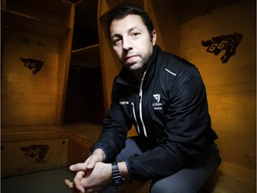 Patrick Grandmaitre, the new head coach of the University of Ottawa men's hockey team, is photographed in the dressing room Monday January 11, 2016.
