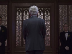 Senator Peter Harder waits to take his place before being officially welcomed to the Senate on Parliament Hill in Ottawa, Tuesday April 12, 2016.