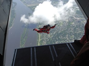 This photo shows a SkyHawk team member parachuting over Ottawa in 2008. Photo courtesy of Canadian Forces