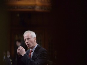 Foreign Affairs Minister Stephane Dion responds to a question during question period in the House of Commons in Ottawa on January 26, 2016. Foreign Affairs Minister Stephane Dion has released documents showing the minister approved the export of $11 billion worth of the $15 billion in light armoured vehicles destined for Saudi Arabia as part of a controversial defence contract. The documents shed new light on the controversial Saudi deal, as well as the Canadian government's view of the murky world of Canadian arms exports to a volatile region.