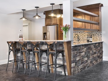 1st place, other rooms: A rustic bar in a walkout basement had to look good from all sides in this project by Natasha Nash of Laurysen Kitchens.