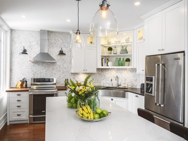 1st place, kitchen, classic/traditional, $20,000-$39,999: Peter Valiquet of Astro Design Centre used a modern vintage look to complement this century home in the category that had the most entries.