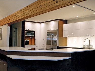 2nd place, kitchen, contemporary/modern, $40,000-$59,999: Dawn Tite of Muskoka Cabinet Company designed a double-angled peninsula and cantilevered prep bar as a signature in this project.
