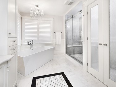 1st place, bathroom, classic/traditional, $25,000-$39,999: Brilliant whites and cool neutrals create a minimalist, yet chic and elegant spa-like ensuite that also won the People’s Choice, bathroom, for Wael Bakr of Laurysen Kitchens.
