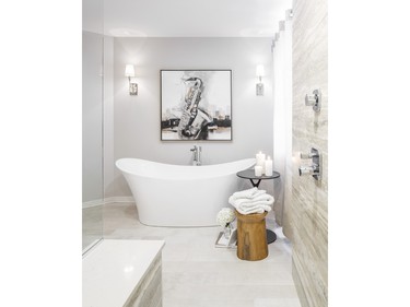 2nd place, bathroom, classic/traditional, $25,000-$39,999: When seen from the adjacent bedroom, the freestanding tub in this reorganized ensuite became the focal point in a design by Nathan Kyle, Astro Design Centre.