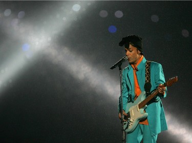 Musician Prince performs during the "Pepsi Halftime Show" at Super Bowl XLI between the Indianapolis Colts and the Chicago Bears on February 4, 2007 at Dolphin Stadium in Miami Gardens, Florida.
