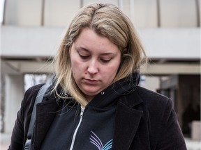 Teacher Jessica Beraldin exits the Ottawa Courthouse on Friday April 1, 2016.