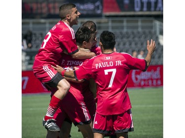 The Ottawa Fury FC celebrate after a goal against the Miami FC at the Fury's home-opener Saturday April 30, 2016 at TD Place.   Ashley Fraser