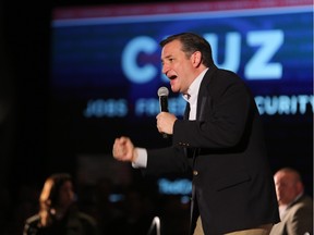 TOPSHOT - US Republican presidential candidate Ted Cruz addresses a rally at the Town and Country Resort and Convention Center on April 11, 2016 in San Diego, California. /