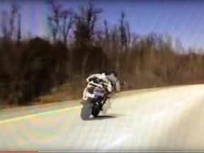 Video shows a ghosting effect due to the speed of a biker roaring past an MRC des Collines cruiser on Saturday, Apr. 16.