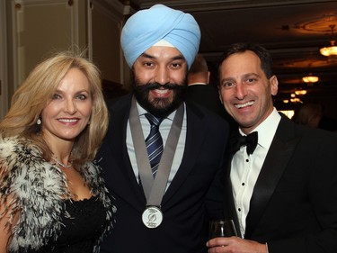 Whitney Fox with Minister of Innovation, Science and Economic Development Navdeep Bains and Dan Goldberg, president and CEO of Telesat, at the Politics and Pen dinner held at the Fairmont Chateau Laurier on Wednesday, April 20, 2016, in support of The Writers' Trust of Canada.