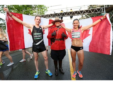 Reid Coolsaet and Lanni Marchant pose for a photo with RCMP Const. Lindsay Williamson after finishing as the the top Canadians in the Ottawa 10K run.