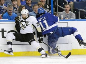 Pittsburgh Penguins&#039; Eric Fehr (16) and Tampa Bay Lightning&#039;s Brian Boyle (11) collide during the second period of Game 4 of the NHL hockey Stanley Cup Eastern Conference finals Friday, May 20, 2016, in Tampa, Fla. (AP Photo/Chris O&#039;Meara)