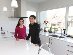 Suzanne and Michael Woo in their kitchen. Photo by Jean Levac