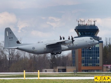 A Canadian Forces CC-130J Hercules transport aircraft takes off from the airstrip at CFB Trenton in Trenton, Ont., on Wednesday, May 4, 2016. The air force is sending a pre-op crew to CFB Cold Lake, Alta., to help out with the wildfires in Fort McMurray.