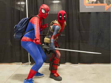 Alex Tremblay, left, and Brian Pasch attended Comiccon this year as Spider-Man and Deadpool, respectively. (Bruce Deachman, Ottawa Citizen)