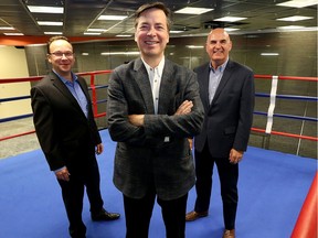 Assent Compliance Chief Product Officer Martin Sendyk, CEO Andrew Waitman and CFO Russell Frederick in the Olympic sized boxing ring at the company's new corporate headquarters in Ottawa's east end. Sendyk and Russell arrived in the past year as part of Waitman's hiring boom.