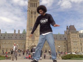 Breakdancer Tyrell Black does his thing on Parliament Hill.
