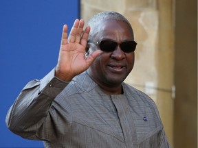 Ghana's President John Dramani Mahama arrives to attend the Anti-Corruption Summit London 2016, at Lancaster House in central London on May 12, 2016. British Prime Minister David Cameron announced plans Thursday to stop the flow of dirty money through the London property market, as he prepared to welcome world leaders and NGOs to an anti-corruption summit. /