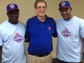 Champions owner Miles Wolff, centre, with two Cuban national legends signed by the Champions, third baseman Donal Duarte, left, and first baseman/DH Alexander Malleta.