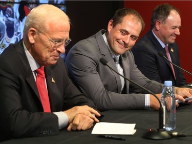 Ottawa Senator Chris Phillips along with Bryan Murray and Pierre Dorion.