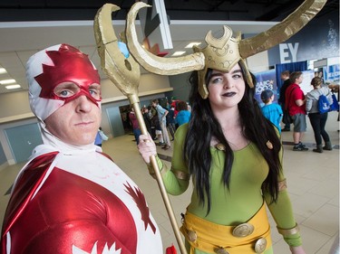 Cosplayers Don Estabrook dressed Captain Canuck and Katrine Loranger-Kozlik as Lady Loki as Ottawa Comiccon 2016 gets underway at the EY Centre.