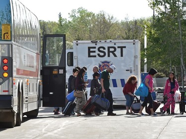 EDMONTON, ALTA: MAY 4, 2016 -- Fort McMurray evacuees that fled the wildfire burning in their city arrive at one of the shelters on a bus at the Expo Centre in Edmonton, May 4, 2016. (ED KAISER/PHOTOGRAPHER) ORG XMIT: POS1605041129154122