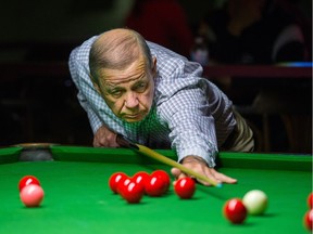 Ervin Budge, or Budgie of Newport Fame, lines up a shot in the Orange Monkey snooker championships Monday night.
