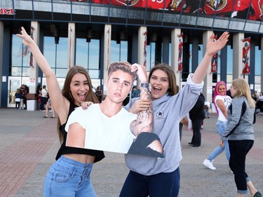 Felina Richer (L) and Claudia Lavigne, Justin Bieber fans, prior to his concert at Canadian Tire Centre in Ottawa, May 13, 2016.  Photo by Jean Levac