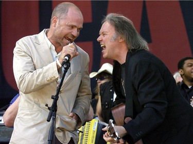 Gord Downie and Neil Young perform during the finale of the Canadian Live 8 concert in Barrie, Ont.