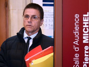 Hassan Diab who was arrested in November 2008 for his alleged role in a 1980 Paris synagogue bombing arrives at the courthouse on May 24, 2016, in Paris.