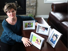Alison Azer, shown here with photos of her four abducted children — Sharvahn,11, Rojevahn, 9, Dersim, 7, and Meitan, 3 — will speak at an event at Christ Church Cathedral in Ottawa on Wednesday, June 8.
