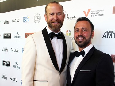 From left, Bruno Racine and his partner Paul Valletta, owners of The Loft spa and salon, at the Hilton Lac Leamy on Saturday, April 30, 2016, for this year's Loft Gala chaired by Racine in support of the Ottawa Regional Cancer Foundation.