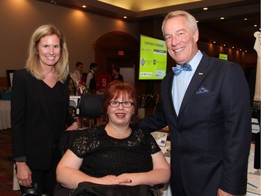 From left, triage nurse Anne Berry from The Ottawa Hospital Rehabilitation Centre with guest speaker and double amputee Karen Toop and Brian Berry, past president of The Rehabilitation Centre Volunteer Association board, at the 17th annual charity auction and dinner held Wednesday, May 18, 2016, at the St. Elias Centre.